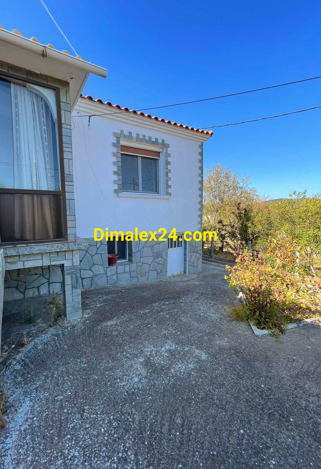 Гасада на къща в Гърция, Проскинитес с приземен и един надземен етаж.