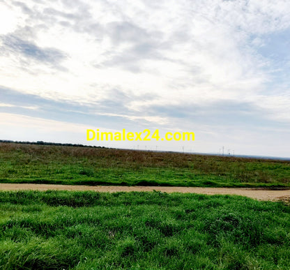 Тих район на Имерос – парцел с лице на път, близо до плажа,област Родопи.