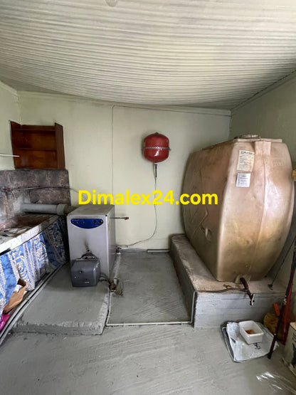 Помещение с отоплителни системи на имот в Гърция.