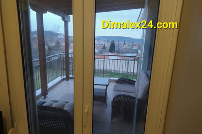 View from a balcony featuring outdoor furniture and scenic landscape in Northern Greece.